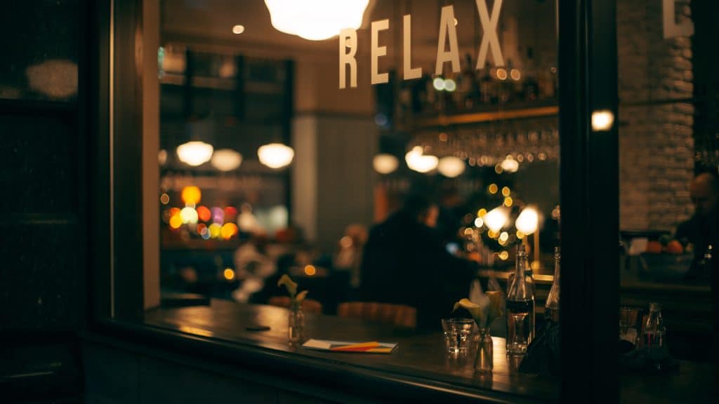Bar with “relax” on the glass window